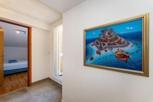 Voodi või voodid majutusasutuse MY DALMATIA - Beach house Privlaka toas