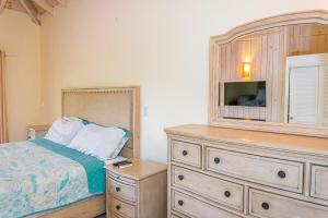 Letto o letti in una camera di Sunsets & Views