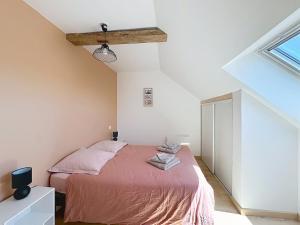 Postel nebo postele na pokoji v ubytování Gîtes Ti Tud-Kozh Le Guébriand et L'Arguenon