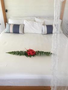 Postel nebo postele na pokoji v ubytování Lomani