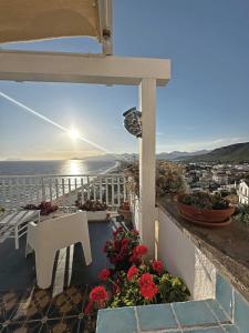a balcony with a table and a view of the ocean at Casa Celeste Sperlongaresort in Sperlonga +45 photos