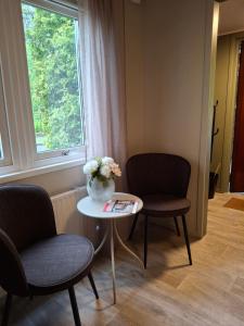 Posezení v ubytování Kattugglans Guestroom