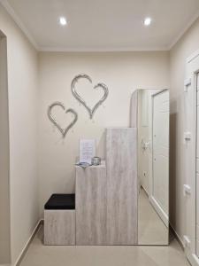 a room with two hearts on the wall at Samos Endless Blue in Samos +49 photos