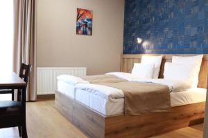 Postelja oz. postelje v sobi nastanitve Hotel 717 Kazbegi