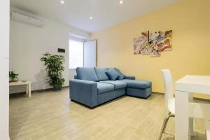 A seating area at Talia Ortigia Apartment