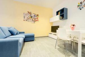 A television and/or entertainment centre at Talia Ortigia Apartment