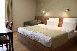 Postelja oz. postelje v sobi nastanitve Hotel 717 Kazbegi