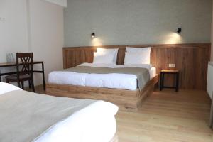 Postelja oz. postelje v sobi nastanitve Hotel 717 Kazbegi