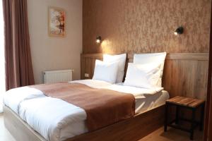 Postelja oz. postelje v sobi nastanitve Hotel 717 Kazbegi
