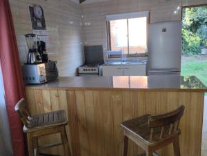 Nhà bếp/bếp nhỏ tại cabañas walls 2 +1 ảnh