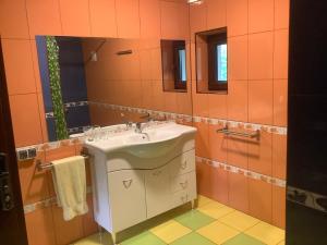 Koupelna v ubytování Garden Inn