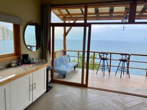 Φωτογραφία από το άλμπουμ του Maya Moon Lodge σε Tzununá