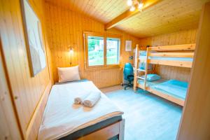 Postel nebo postele na pokoji v ubytování Chalet vue Alpes et lac