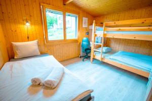 Postel nebo postele na pokoji v ubytování Chalet vue Alpes et lac
