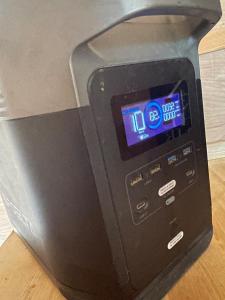 a close up of a machine with a clock on it at Lake View LOFT Cabin off grid Solar in Wasilla