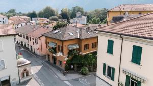 an overhead view of a city street with buildings at Hotel Ristorante San Giuseppe in Cernobbio