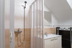 Koupelna v ubytování RESIDENCE du SOLEIL + 37 fotografií