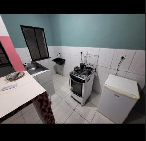 Kuchyň nebo kuchyňský kout v ubytování Residencial Romulo AP 3