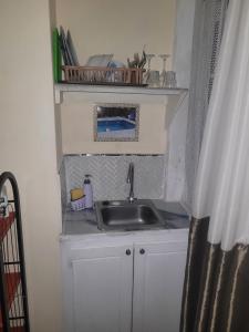 Cucina o angolo cottura di 4Js Vacation Inc. - Luxury Studio