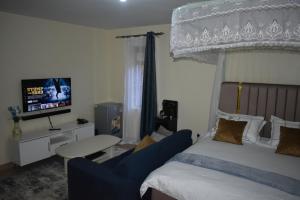 Postel nebo postele na pokoji v ubytování Southside Juja 1 Bedroom