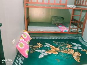 Voodi või voodid majutusasutuse RM Fairyland Adventure Resort toas