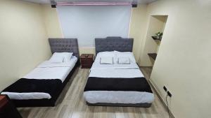 Postel nebo postele na pokoji v ubytování Roma House V- Campin Movistar El Cubo