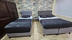 Postel nebo postele na pokoji v ubytování Roma House V- Campin Movistar El Cubo