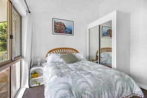 Ένα ή περισσότερα κρεβάτια σε δωμάτιο στο Luxe & Spacious Gem with Pool, Ocean Views, Snooker Table