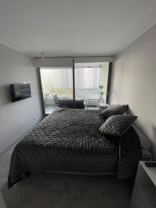 Postel nebo postele na pokoji v ubytování Modern apartment in Montemar