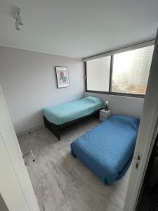 Postel nebo postele na pokoji v ubytování Modern apartment in Montemar