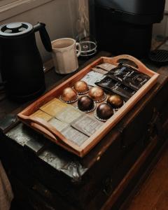 a tray of balls sitting on top of a table at Book Village Inn - Entire Hotel in Hobart