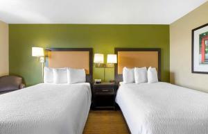 Postel nebo postele na pokoji v ubytování Extended Stay America Select Suites - Dallas - Richardson