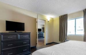 Postel nebo postele na pokoji v ubytování Extended Stay America Select Suites - Dallas - Richardson