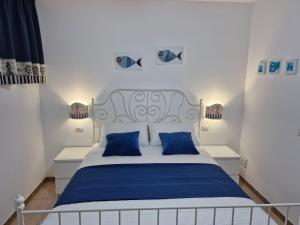 Ένα ή περισσότερα κρεβάτια σε δωμάτιο στο Torre dell'Alto apartment