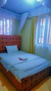 Rúm í herbergi á Joy apartment