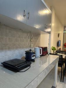 Kuchyň nebo kuchyňský kout v ubytování JORA Studio Apartment 1-B