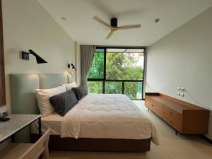 Ένα ή περισσότερα κρεβάτια σε δωμάτιο στο InterContinental Khao Yai Residence - 100 SQM 2 Bedrooms and 2 Bathrooms +39 φωτογραφίες