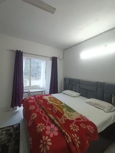 Postel nebo postele na pokoji v ubytování hotel apex heritage