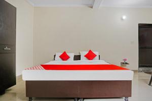 Postel nebo postele na pokoji v ubytování Hotel O Dremland Residency + 17 fotografií