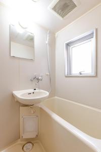 Koupelna v ubytování エルドラード - Apartment stay + 15 fotografií