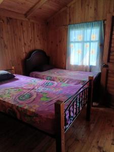 Giường trong phòng chung tại Casa Cucuya +32 ảnh