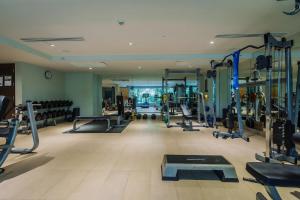 a gym with lots of treadmills and machines at NEW Malee Resort Studio 858 in Rawai Beach