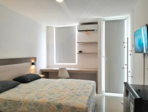 TV a/nebo společenská místnost v ubytování The alt room by Vivo apartemen