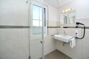 Koupelna v ubytování Ferienwohnung "Ostseebrise" + 15 fotografií