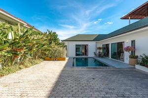 Πισίνα στο ή κοντά στο V189 Stylish 3BR Hideaway Pool & Beach Vibes