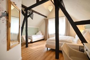Postel nebo postele na pokoji v ubytování Hotel Zehnthof