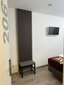 Posteľ alebo postele v izbe v ubytovaní HOSTAL LETTO DAL MARE