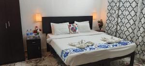 Postel nebo postele na pokoji v ubytování Casa Anjo