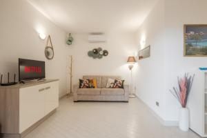 Χώρος καθιστικού στο LE MUSE Residence - Punta Tegge