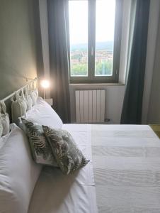 Postel nebo postele na pokoji v ubytování Rapafreccia BeB